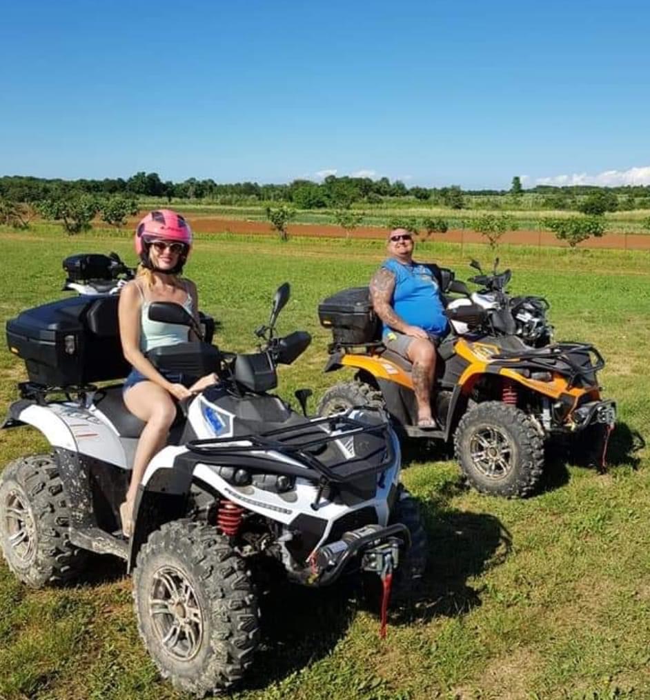 Quad tour participants on an off-road trail in Istria